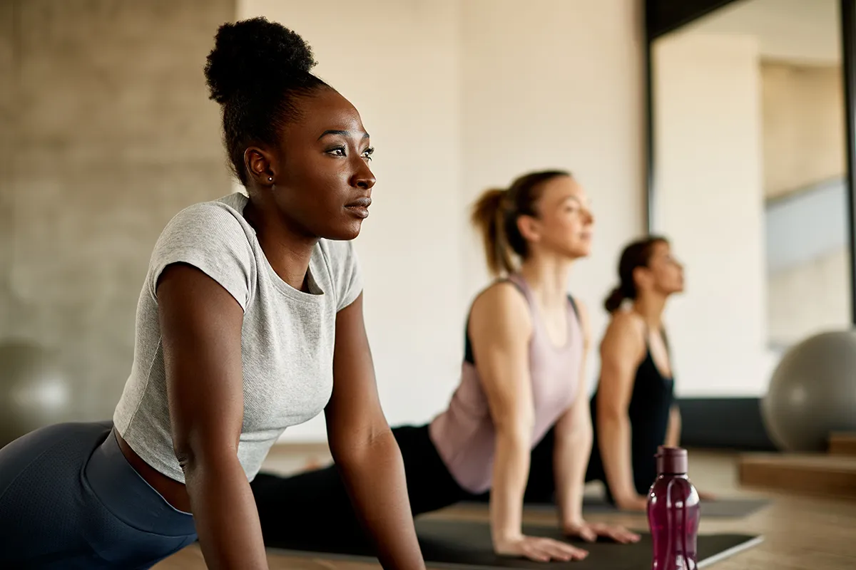women stretching during an exercise class